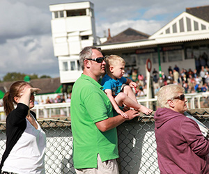 Family in the course enclosure